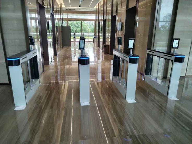 Automated barriers and biometric turnstiles at main gates provide a hard-shell defense against unauthorized vehicle and foot traffic